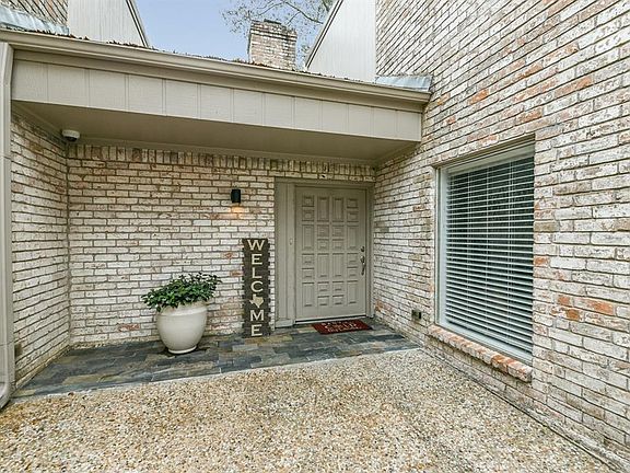 This home is located in a golf course community of Hearthstone Country Club.