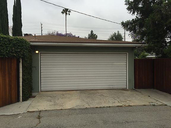 Garage in alley with back ga