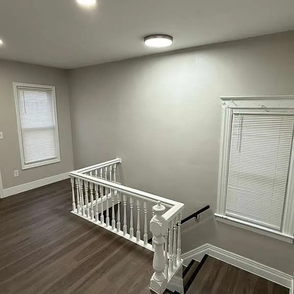 Foyer that leads to the front bedroom, and front facing Porch.