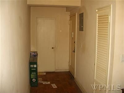 View of entry hall with two closets. 