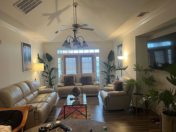 Living room and back balcony