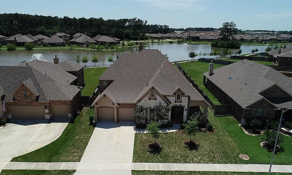 Mint condition describes this jewel of a property in Willow Lake Village. 22831 Dale River Road. Awesome views of the lake and a