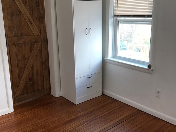 Bedroom with hardwood floors