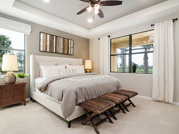 Model Representation Spacious owner s suite with large window and optional tray ceiling