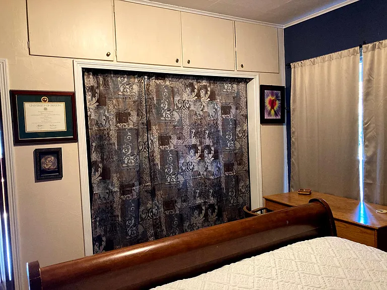 Closet curtain over the closet.
