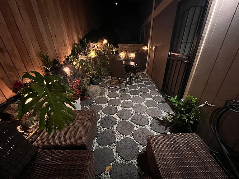 Cozy, private outdoor seating area_perfect for relaxing evenings or quiet mornings.