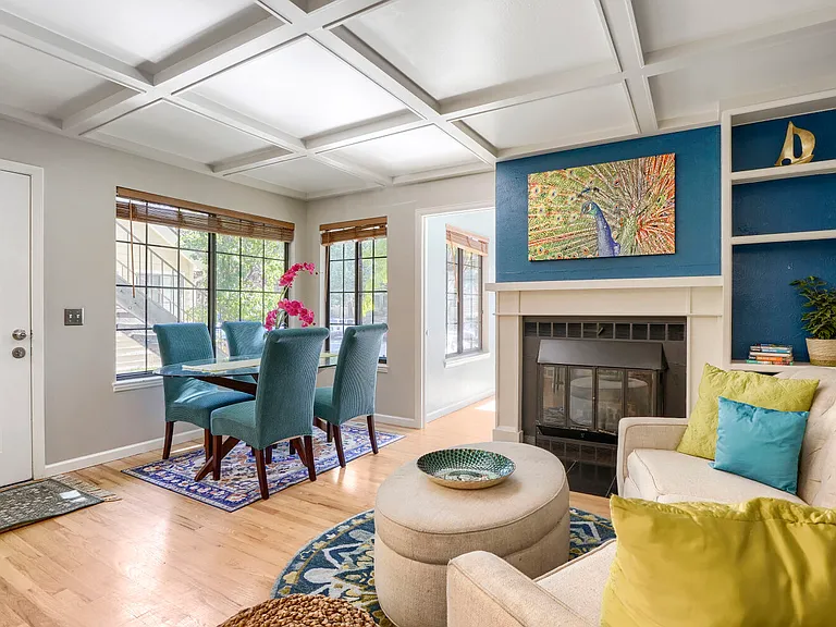 Living & Dining Area _ This central gathering space combines architectural character, built-in details, and a versatile layout perfect for relaxing evenings, dining, and hosting guests.