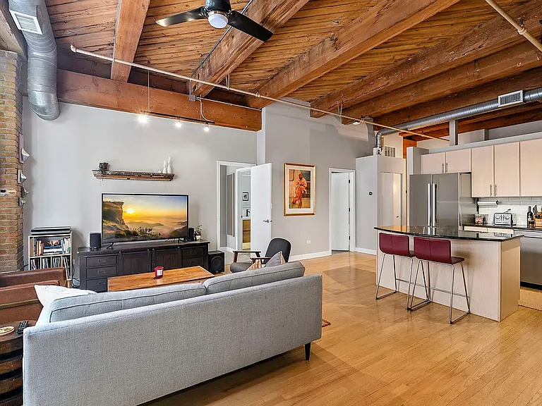 Open-concept living space with easy movement around the kitchen island