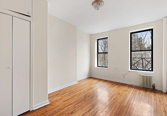 2nd image of 109 E 2nd St #16
