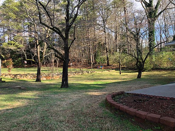 Spacious lawn with mature trees