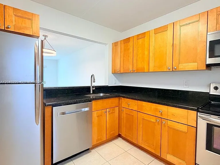 7705 Camino Real #B-413 — Photo 1