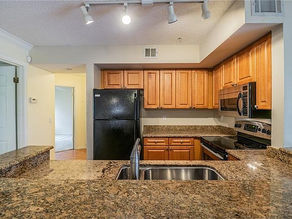 5th image of 2400 Feather Sound Dr APT 436