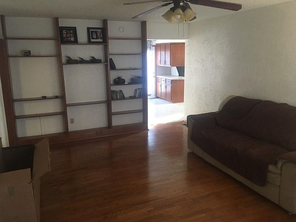 Den leading into the kitchen