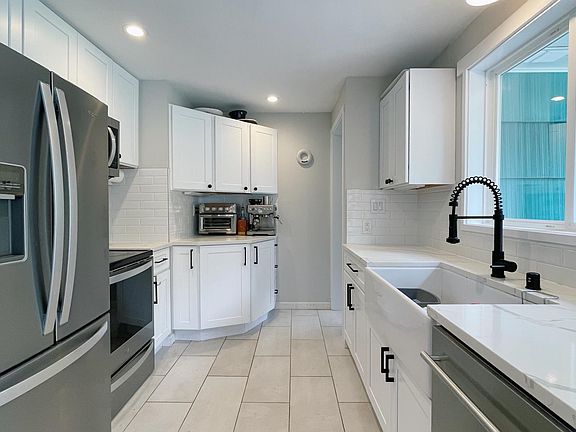 Updated kitchen with brand new stainless appliances