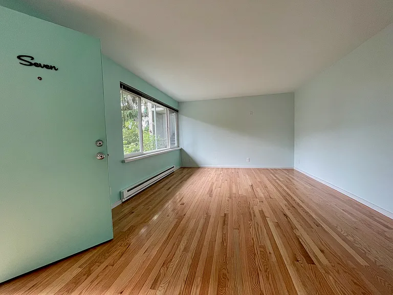 Large living room with big south facing windows