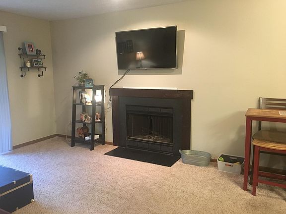 Living Room With Wood Burning Fire Place