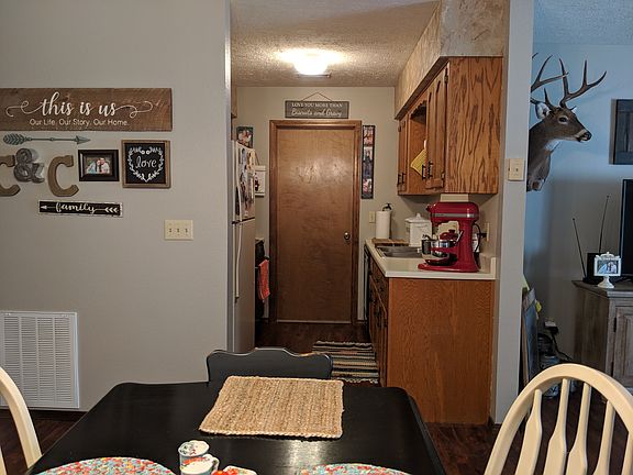 Standing at patio door looking into the kitchen
Door goes into laundry room which goes to garage