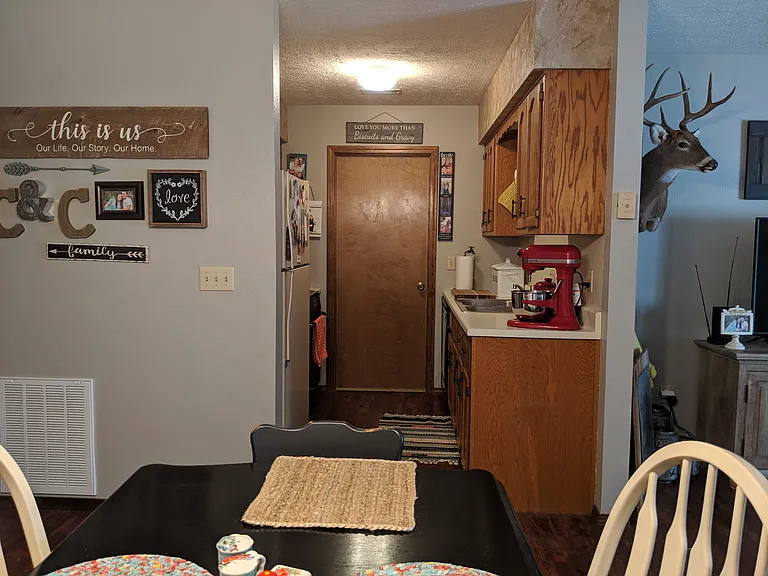 Standing at patio door looking into the kitchen
Door goes into laundry room which goes to garage