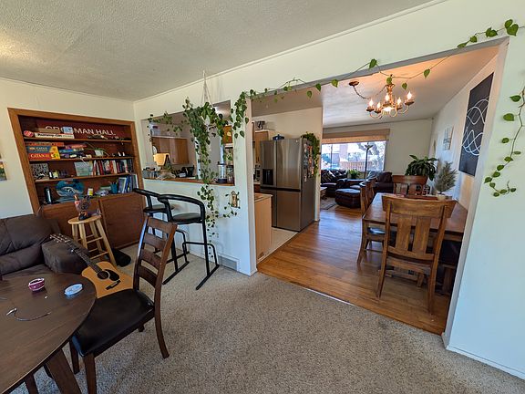 Sun room (looking into dining room, kitchen, living room)
