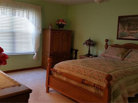 First floor Master with walk in closet and private door to main bath.