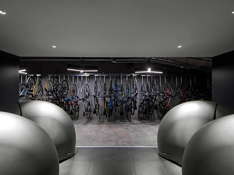 Secure, stylish, and ready to ride_our indoor bike storage makes commuting and adventure effortless.