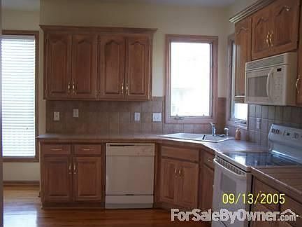 Looking into Kitchen from Garage Hallway
