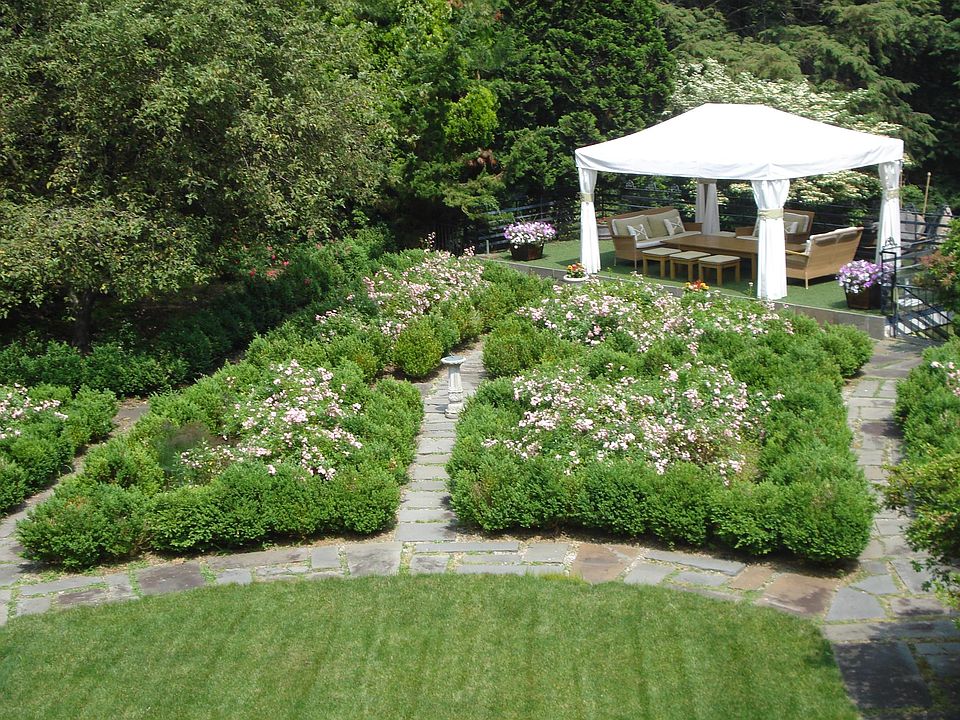 Garden maze w/ roses. Gazebo over pool house w/ 2 bathrooms.