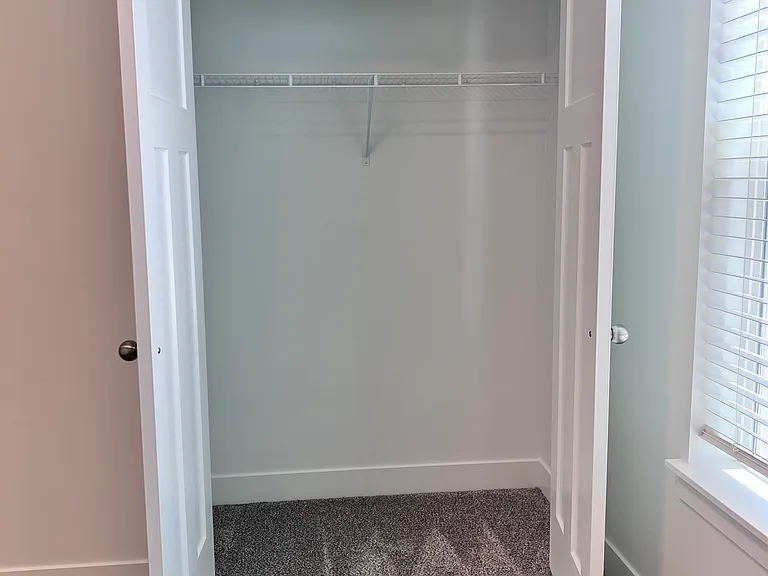 Second bedroom closet with french doors