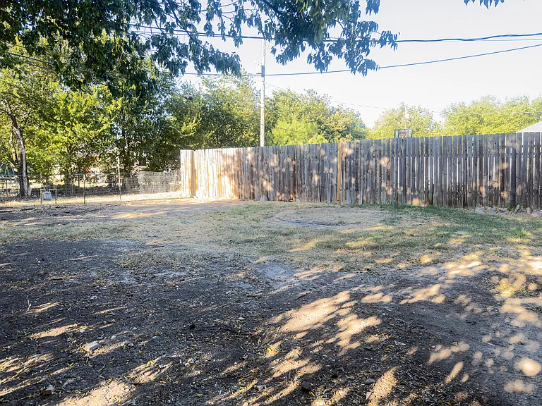 Backyard, partially fenced