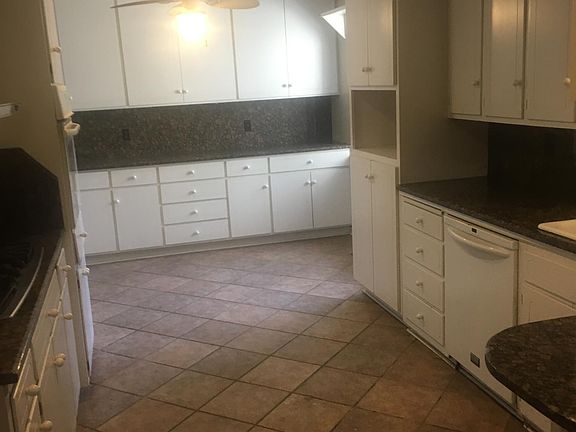 Large kitchen with granite counters