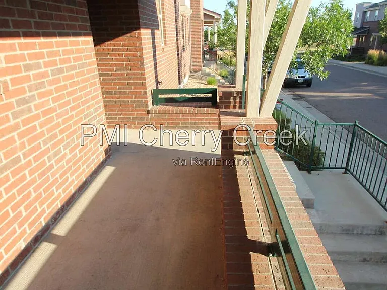 6385 S Xanadu Way — Photo 2