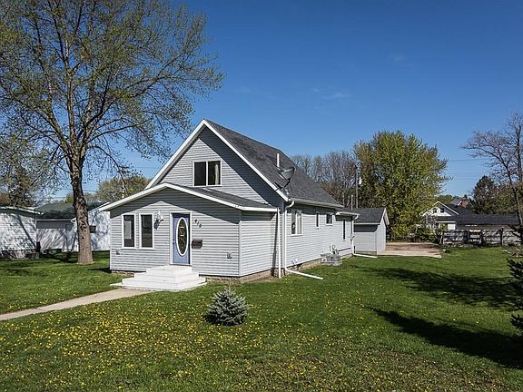 Rare 4 bedroom - One and a half story home in central Shakopee sits on an oversized lot and a half parcel.