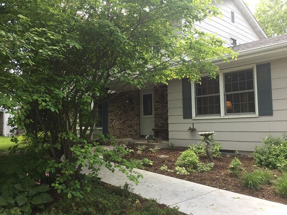 Front entrance with a new sidewalk entry