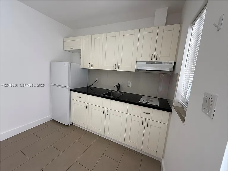 242 NE 55th Ter #2 — Photo 2