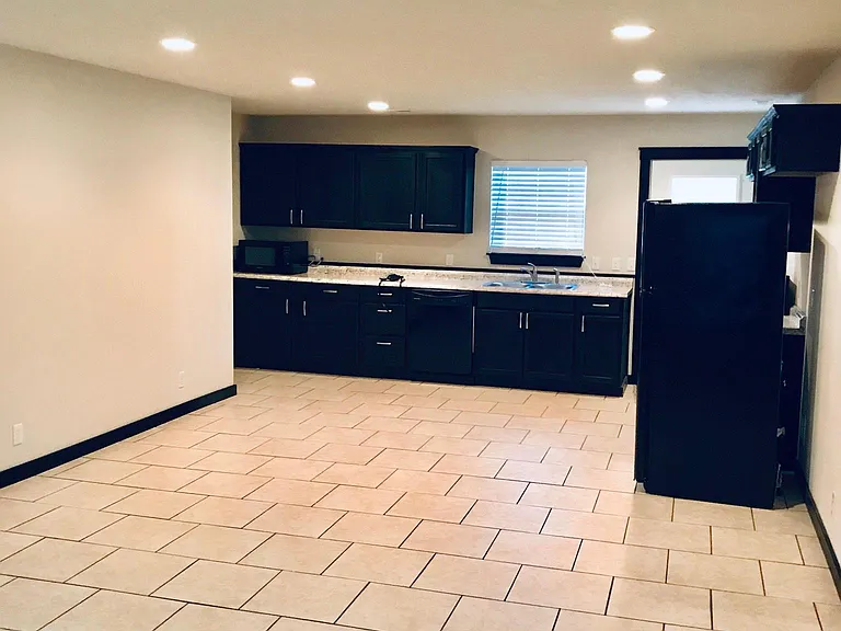 View of kitchen from living area