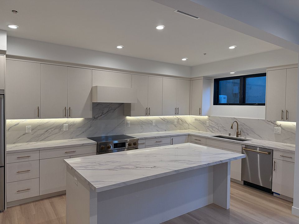 Massive chef's kitchen with luxury appliances