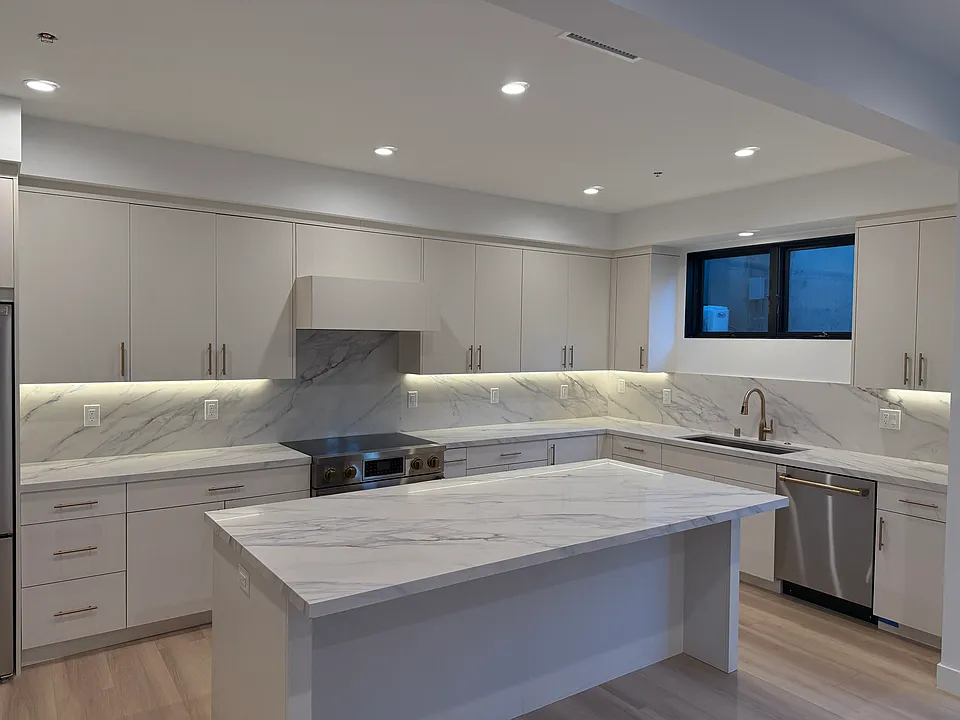 Massive chef's kitchen with luxury appliances
