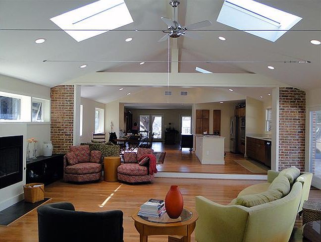 The living space, with skylights, fireplace.