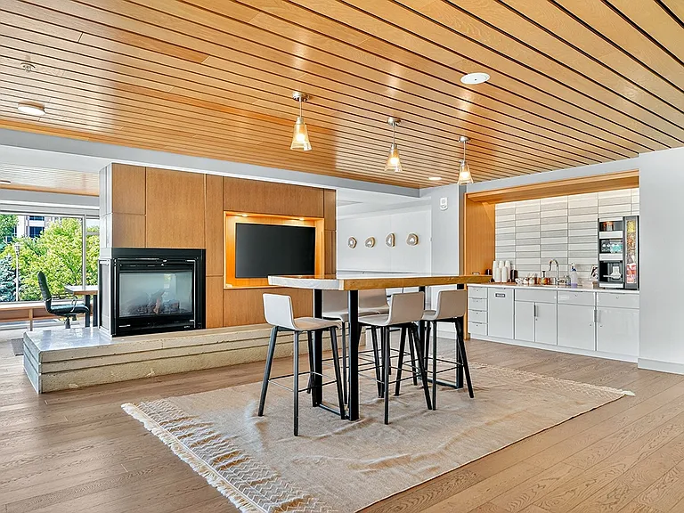 Hang out in our lounge space next to a fireplace and coffee bar.