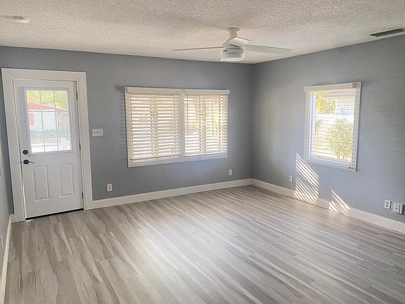 Living room, boasting abundant natural light.