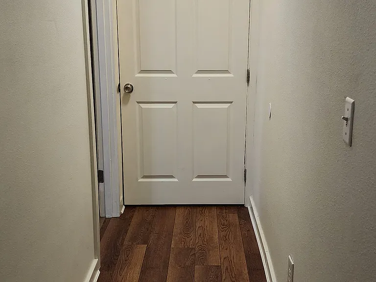 Large closet at the end of this hall. There is also a storage closet in the first hallway.