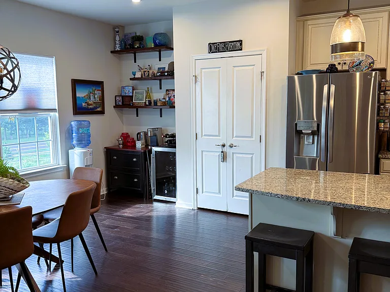 Large pantry and a nook that be used as a coffee station or work area