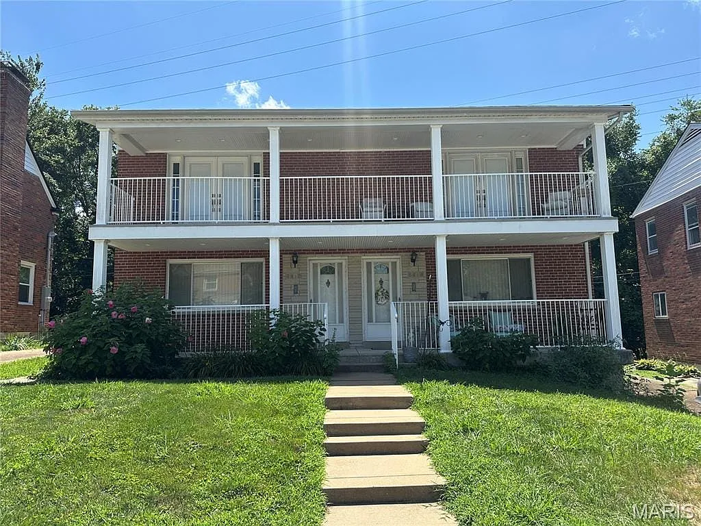 Photo 1 of 17 - 8412 Winzenburg Dr - Richmond Heights, MO Front door is on the left side of duplex - 8412 Winzenburg Dr
