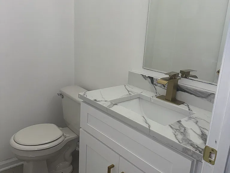 another view of half bathroom