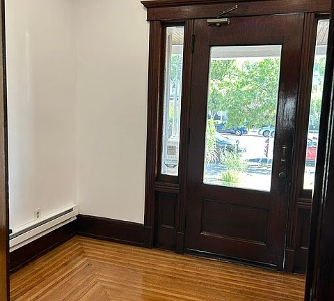 FRONT ENTRY: Beautiful refinished floors, Lovely original door. Wonderful lighting.
