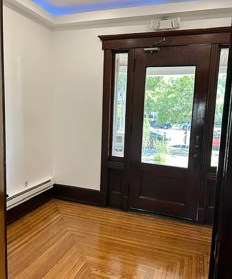 FRONT ENTRY: Beautiful refinished floors, Lovely original door. Wonderful lighting.