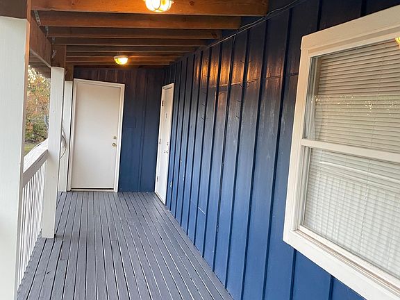 Entry balcony with separate entry to own private laundry room ready with hook ups for a washer and dryer. Has new tankless water heater, so never run out of hot water!