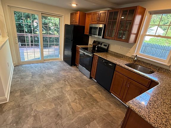 Kitchen with sliding door to deck
