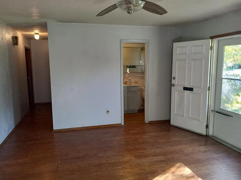 Living Room with attached 1/2 bath access