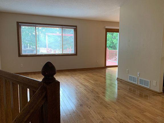 Large living room with hardwood floors.